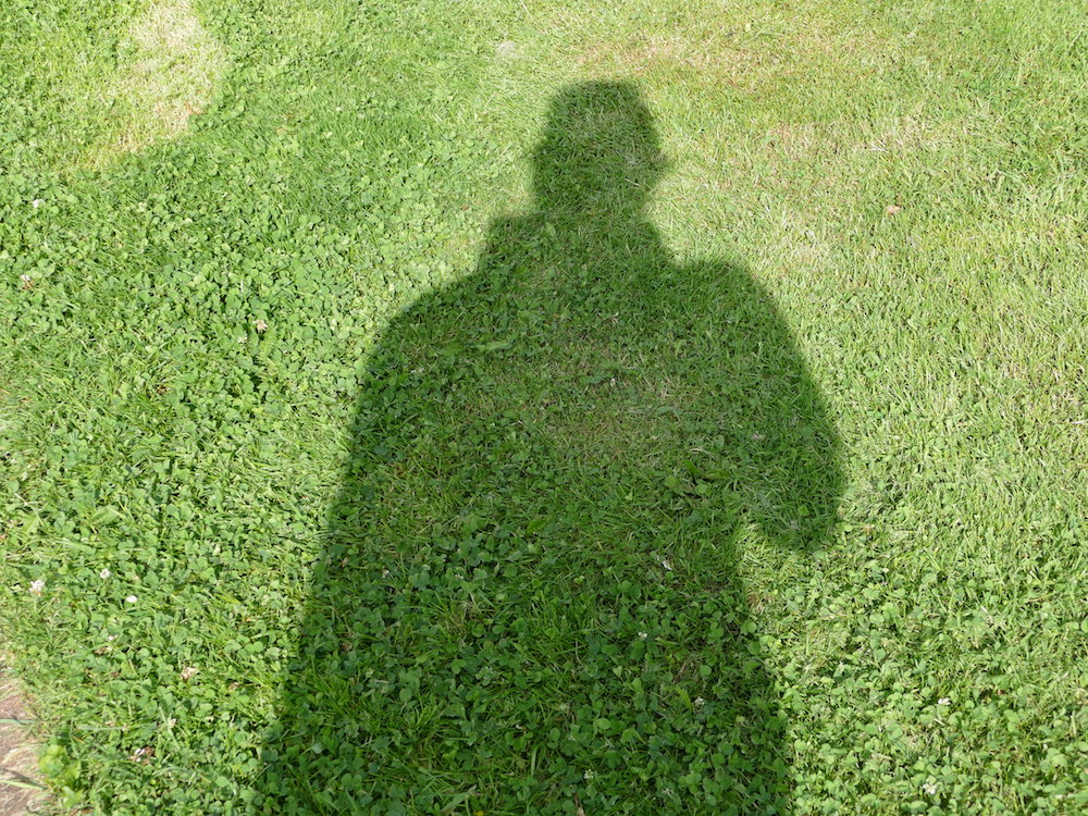 schatten umriss fotograf beim stadtbummel